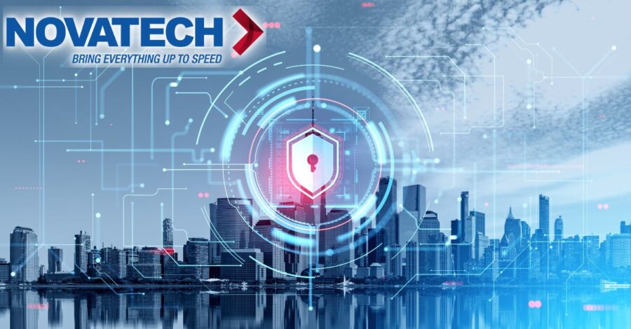 A futuristic cityscape is overlaid with digital network lines and a glowing shield icon, symbolizing technological