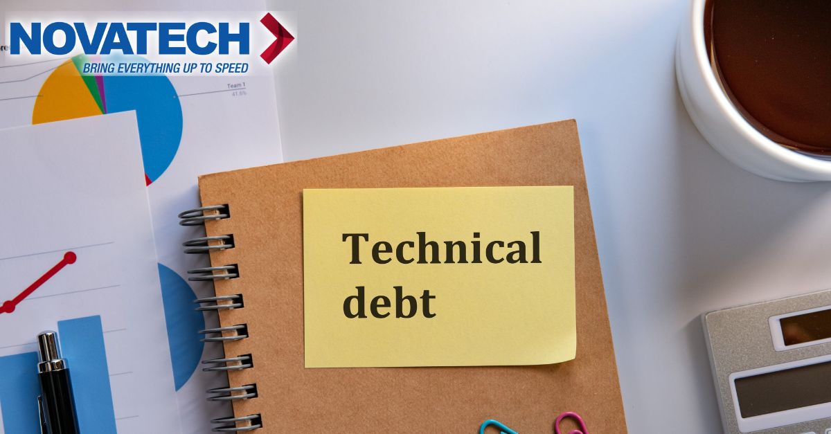 A notebook with a sticky note reading 