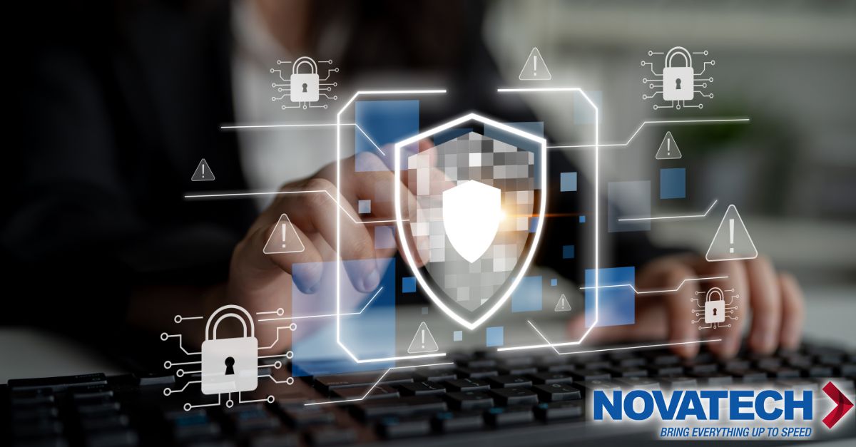 A person's hands interact with a digital security interface featuring a shield, locks, and warning signs, overlaid on a